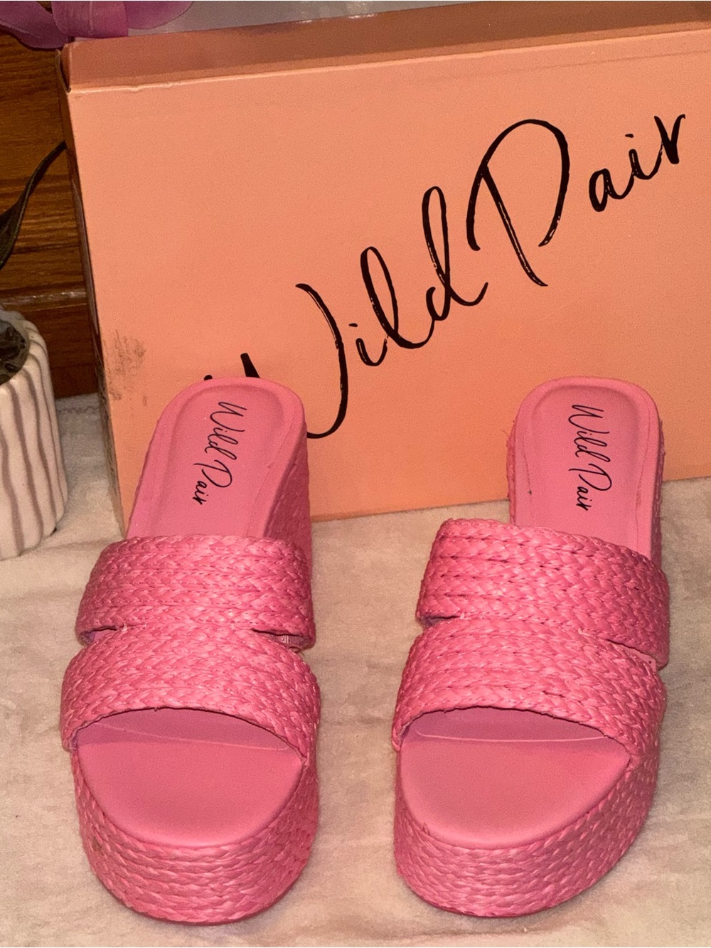 Niftyy sandals from Wild Pair Woven straps and espadrille platforms add texture